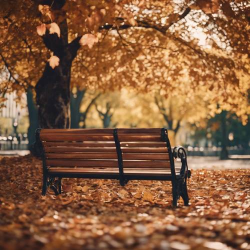Brown autumn leaves falling gently around a tranquil park bench.