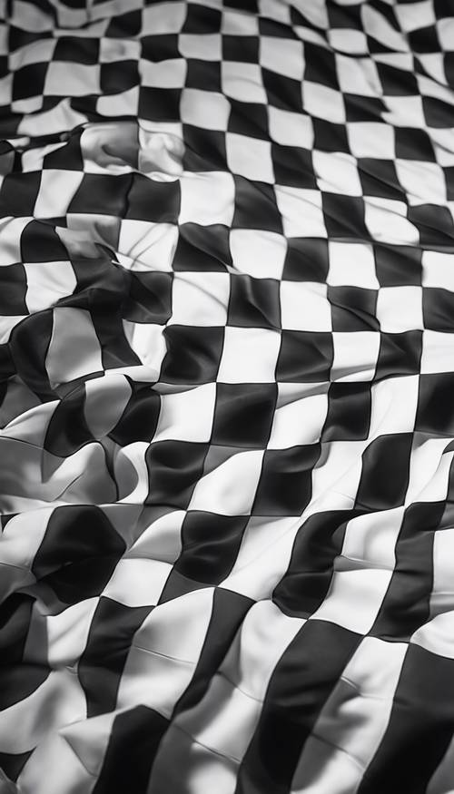 Um close de um padrão xadrez preto e branco iluminado pela suave luz da manhã.