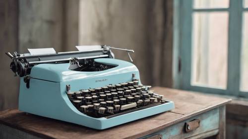 A unique pastel blue typewriter sitting on an old, rustic desk.