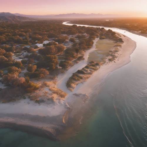 Bird's eye view of pastel-colored sunset over Malibu lagoon state park