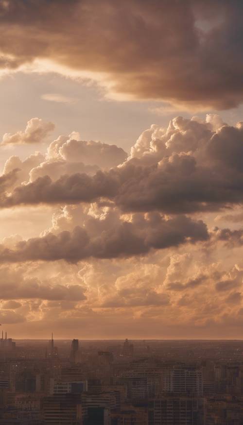 A clear horizon with a formation of thick beige clouds at sunset.