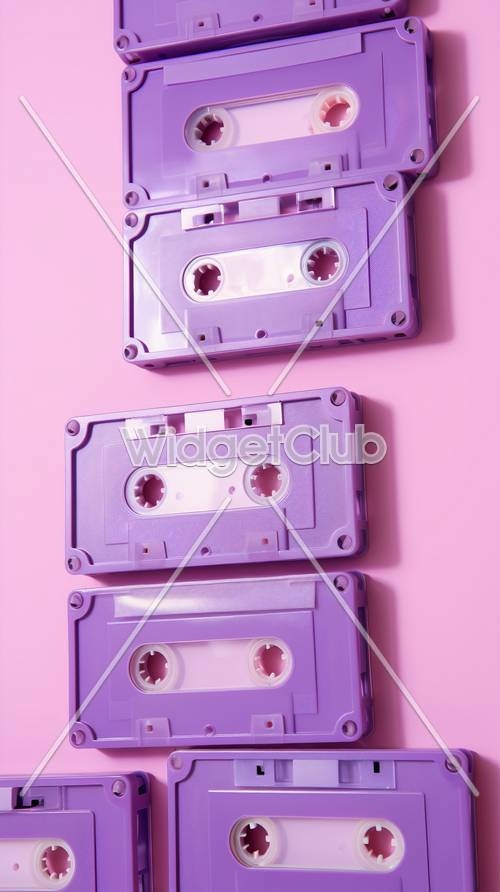 Purple Cassette Tapes on Pink Background Hintergrund[0814be51903c4946990e]