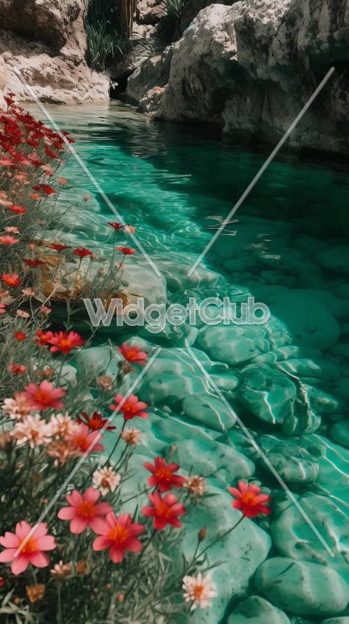 아름다운 붉은 꽃과 수정처럼 맑은 청록색 물