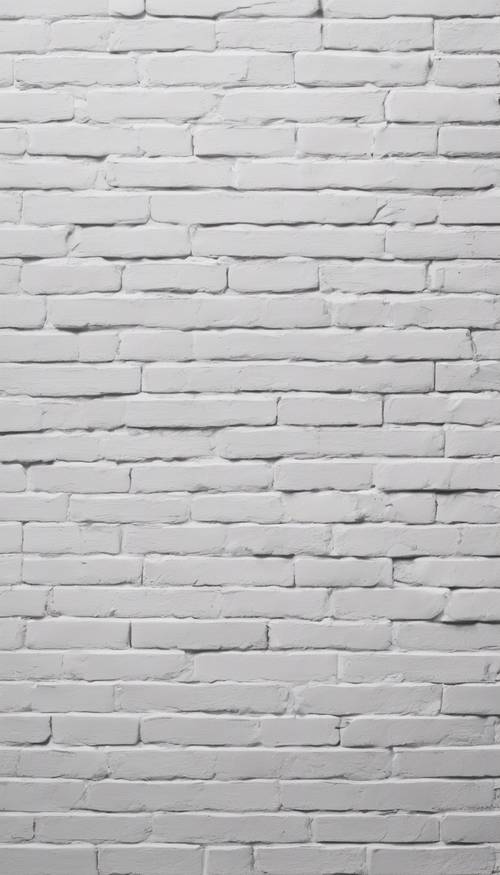 Imagem detalhada de uma parede de tijolos brancos recém-pintada.