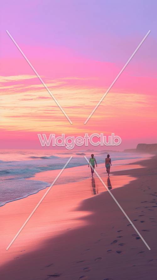 Promenade sur la plage au coucher du soleil rose