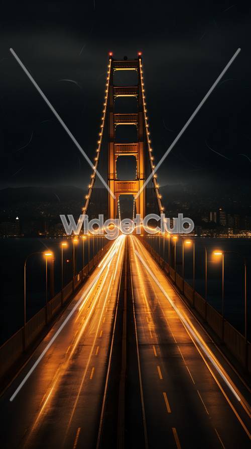 جسر البوابة الذهبية في الليل مع أضواء المدينة ونجومها