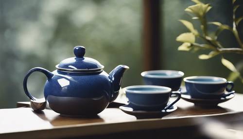 A minimalist image of a traditional Japanese blue tea set.