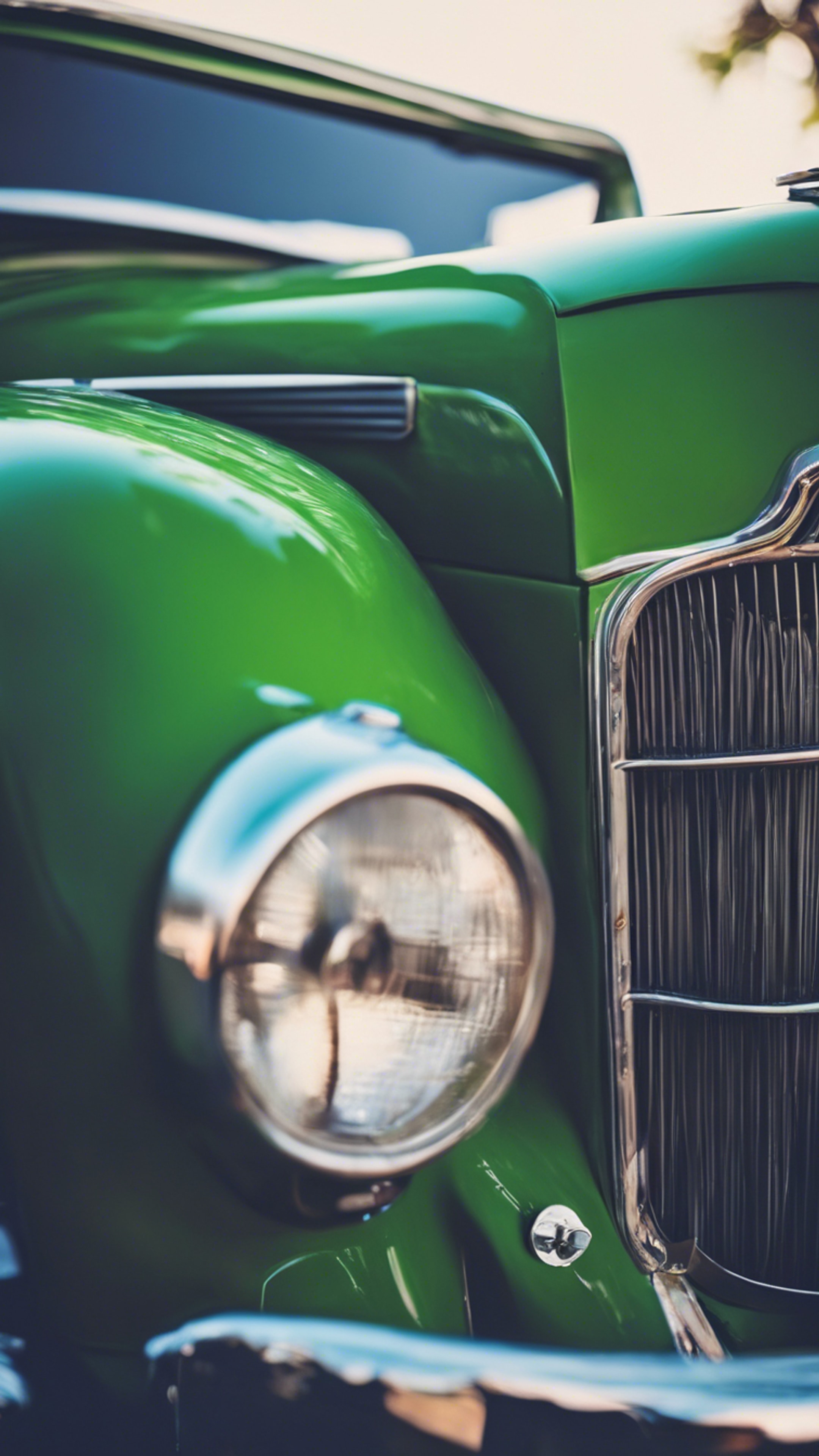 An old vintage car painted in a unique combination of navy blue and neon green. Ფონი[febf49cbb4064c31beae]