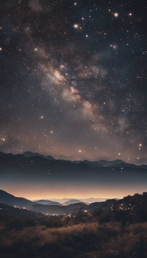 Mroczny krajobraz pod rozgwieżdżonym nocnym niebem, wypełniony niezliczoną liczbą migoczących gwiazd.