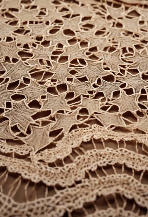 Tan lace with star-shaped patterns intertwined. Tapet [0c8e42da4a8e44fbaf7d]