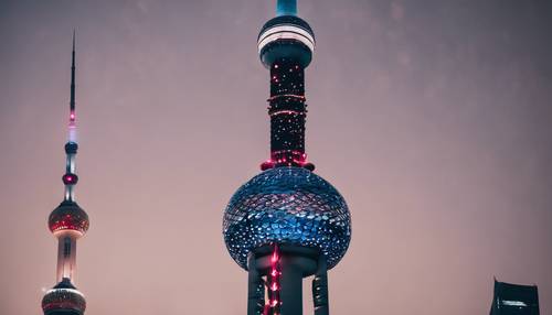 Close-up shot of the iconic Pearl Tower in Shanghai at night