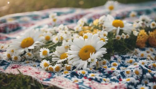 Rantai bunga aster yang dibuat dengan tangan dengan cinta, diletakkan dengan lembut di atas selimut piknik bermotif boho.