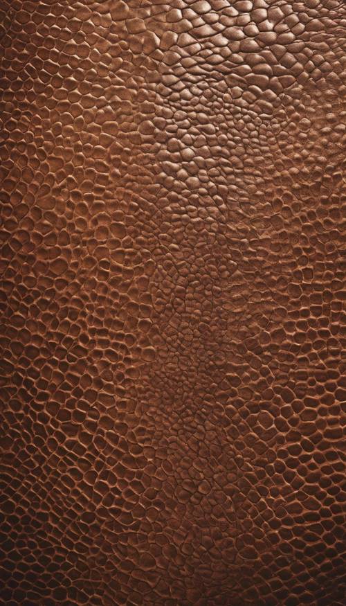 A visualization of snake-embossed leather material, with a close focus on texture and detailed imprints.