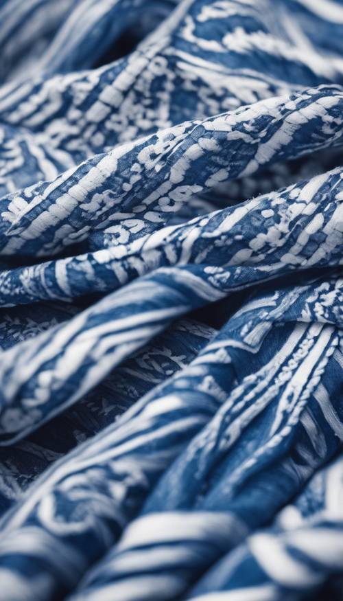 Patrón de bufandas de invierno azules y blancas, entrelazadas con precisión.