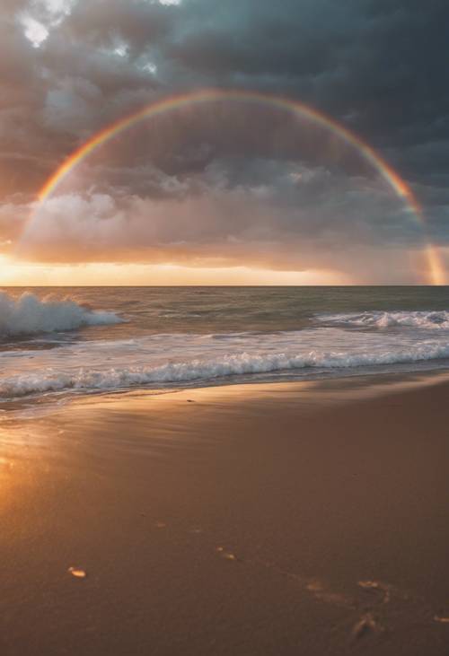 Un doble arco iris capturado durante una puesta de sol en la playa del mar.