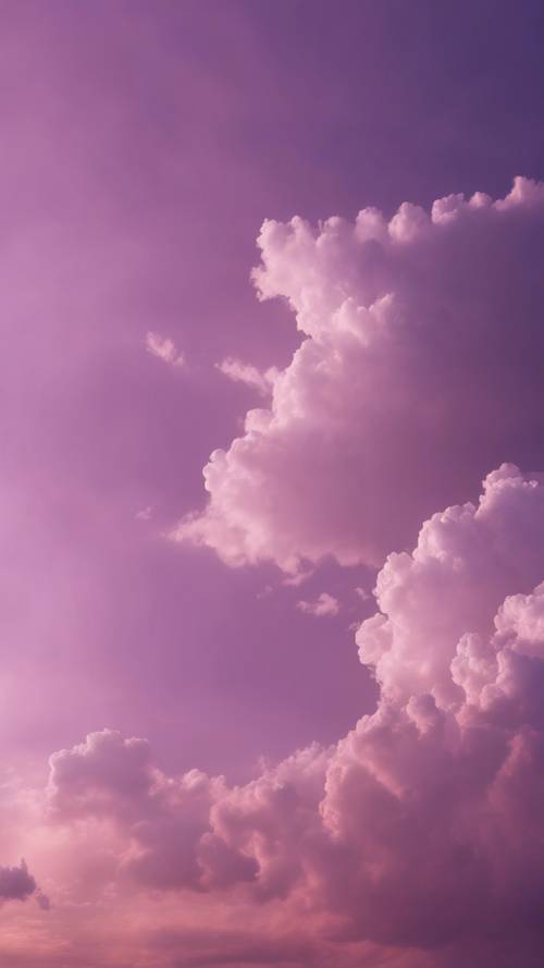 연한 보라색으로 칠해진 숨막히는 저녁 하늘과 한 뭉치의 흰 구름이 흩뿌려져 있습니다.