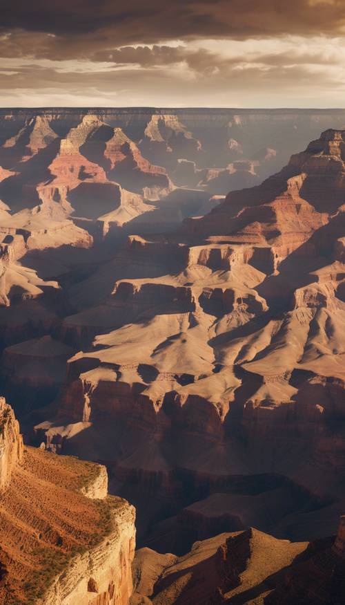 Огромный величественный каньон, купающийся в солнечном свете золотого часа, с облаками, отбрасывающими тени.