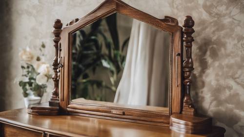 A vintage oak vanity mirror reflecting an elegant classic bedroom.