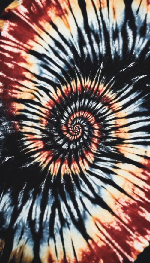 A black tie dye shirt with a spiral pattern in the center. Tapeta [07330026498149de8bab]