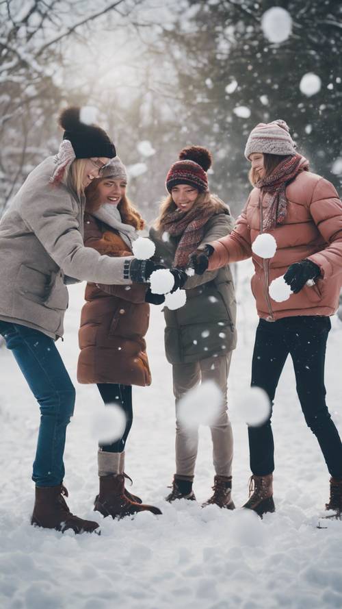 Um grupo de adolescentes arrumadinhos brigando de bolas de neve em um parque de inverno