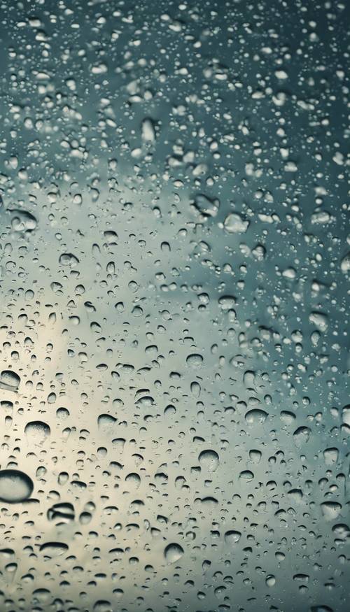 Бесшовный рисунок капель дождя на оконном стекле, пасмурный день за окном.