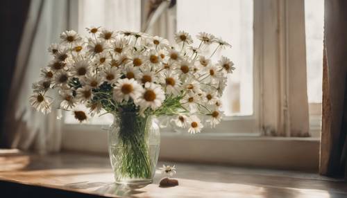 A bohemian inspired room filled with natural light illuminating a vase of fresh daisies at the center.