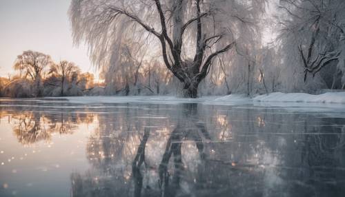 Light reflections on the ice of a frozen river crossing a silent, snowy city park.