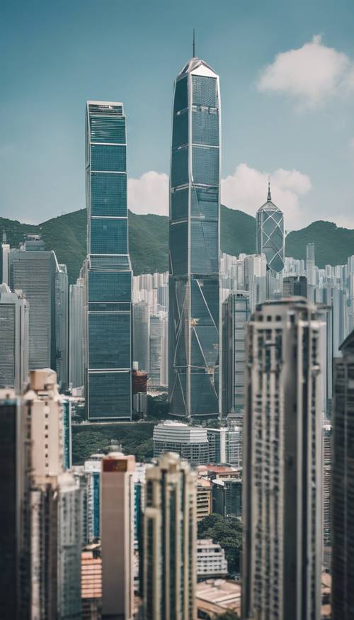 Die Skyline von Hongkong mit dem ikonischen Bank of China Tower, der sich hoch vor einem klaren, blauen Himmel abhebt.