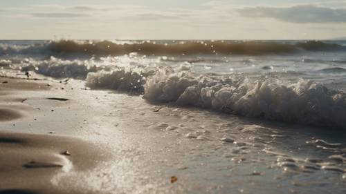 A peaceful September seaside with waves gently lapping the shore