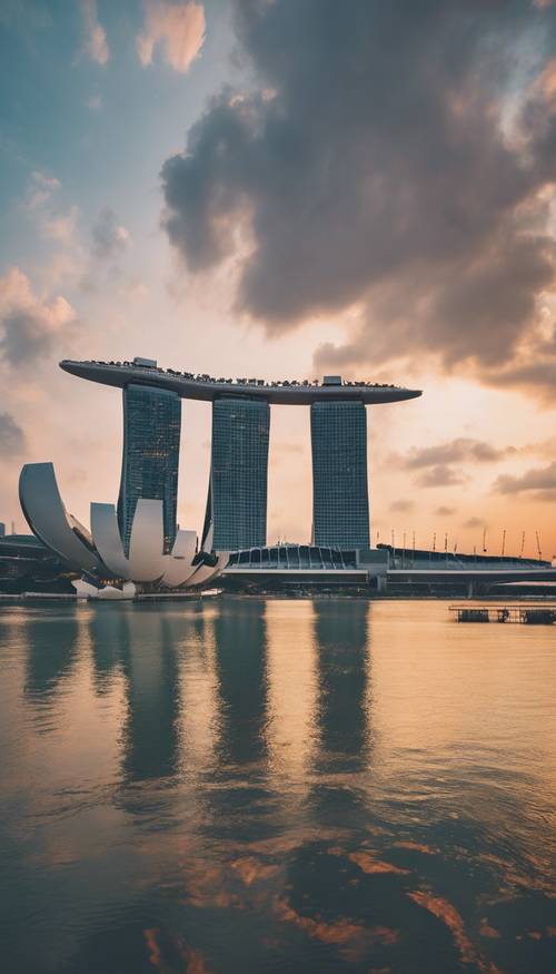 마리나 베이 샌즈 및 아트사이언스 박물관과 같은 상징적인 랜드마크가 포함된 일몰 시 싱가포르 스카이라인의 탁 트인 전망입니다.
