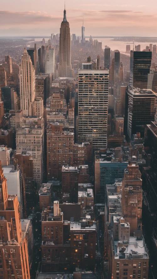 Pemandangan cakrawala Kota New York yang indah dalam rona lembut fajar.