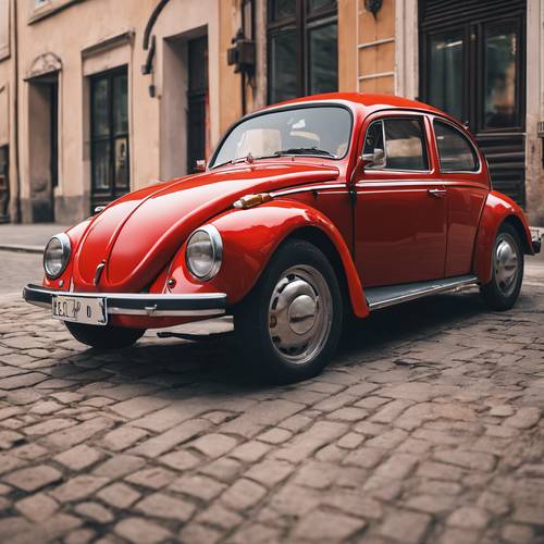 Mały, uroczy, czerwony Volkswagen Beetle zaparkowany na słonecznej ulicy.