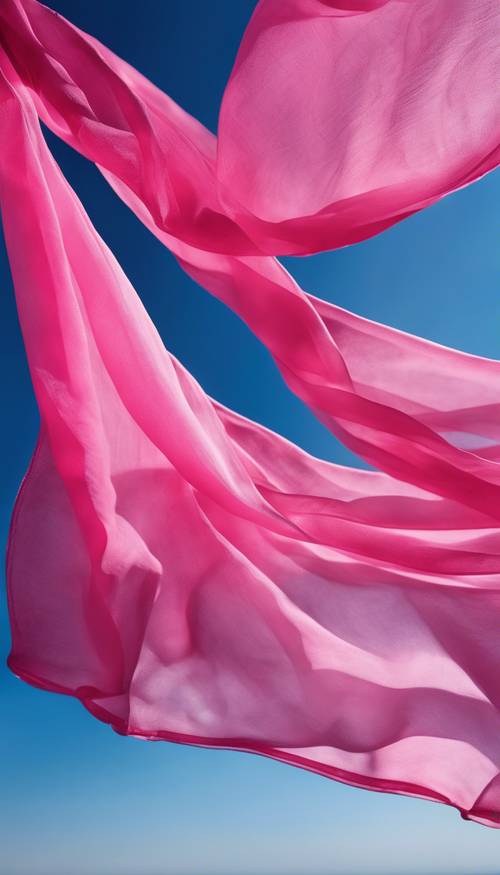 Una ligera bufanda de gasa de color rosa intenso que ondea elegantemente contra un cielo azul profundo, cuyo color cambia suavemente del rosa denso al rosa suave.