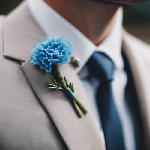 A blue carnation pinned on a groom's suit at a wedding.