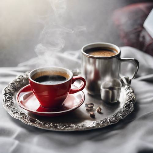 A steaming cup of coffee on a silver tray with a red book alongside. Tapet [c601ecdcbc9c4922989d]
