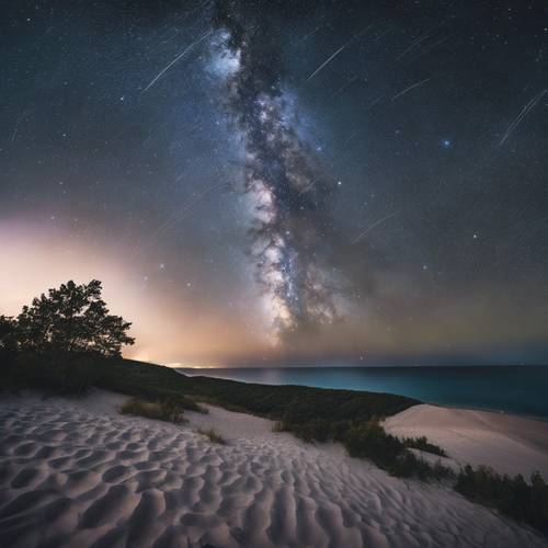 Surrealistyczne nocne niebo nad wydmami Śpiącego Niedźwiedzia z tysiącami gwiazd i Drogą Mleczną w pełnym widoku. Tapeta [4a7094be793442708b3d]