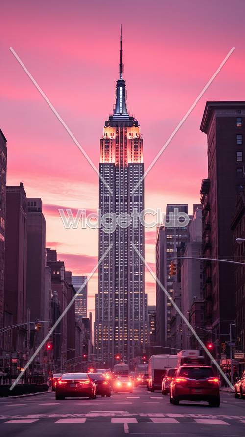 ピンク色の空が象徴的な摩天楼を彩る壁紙