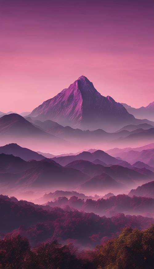 A stunning mountain range is captured at dawn, the landscape immersed in a dark ombre from twilight purple to soft dawn pink.