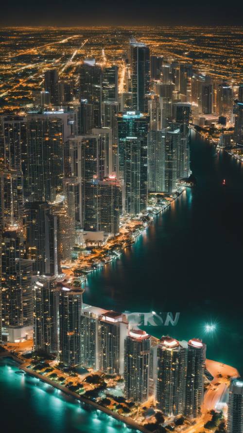 Uma vista aérea de Miami à noite, com as luzes brilhantes da cidade se estendendo até onde a vista alcança, refletindo nas águas vítreas do oceano.