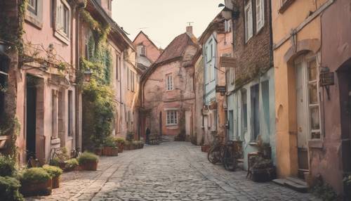 Un collage pastel de rêve représentant une vieille ville avec des bâtiments rustiques et des rues pavées.