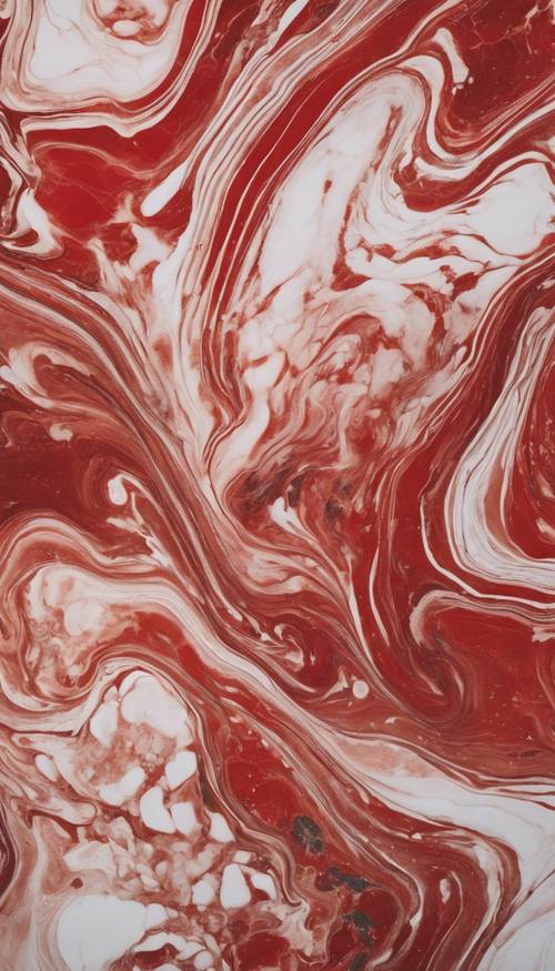 从空中俯瞰，一片红色和白色漩涡状大理石海洋。