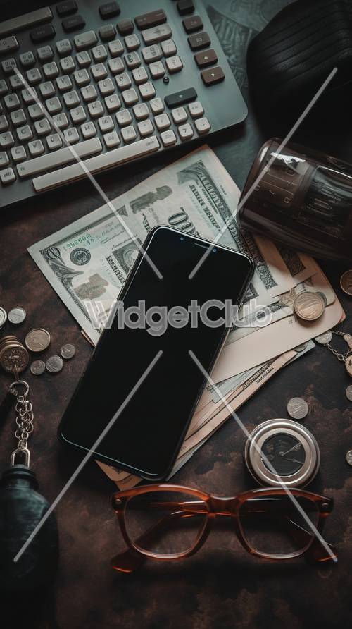 Điện thoại thông minh và tiền trên nền bàn