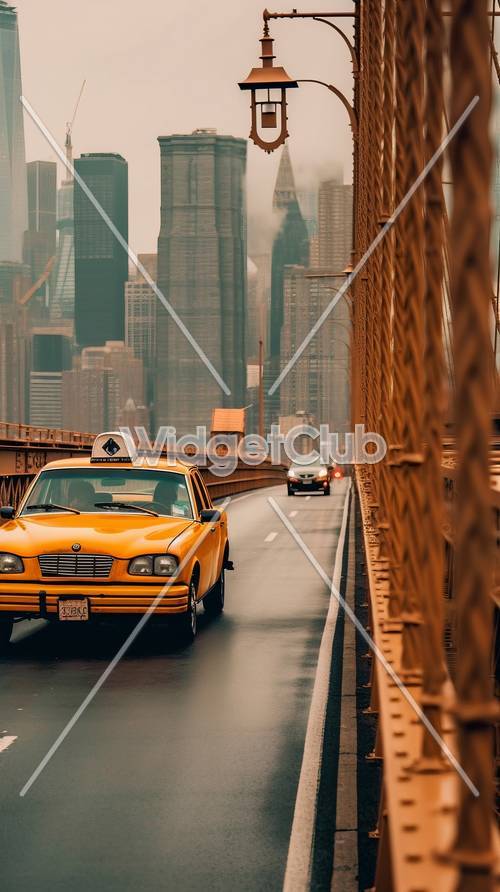 都会の橋を走る黄色いタクシー
