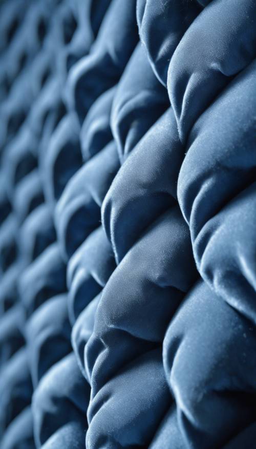 ภาพมาโครที่มีรายละเอียดซึ่งแสดงพื้นผิวของผ้ากำมะหยี่สีน้ำเงิน