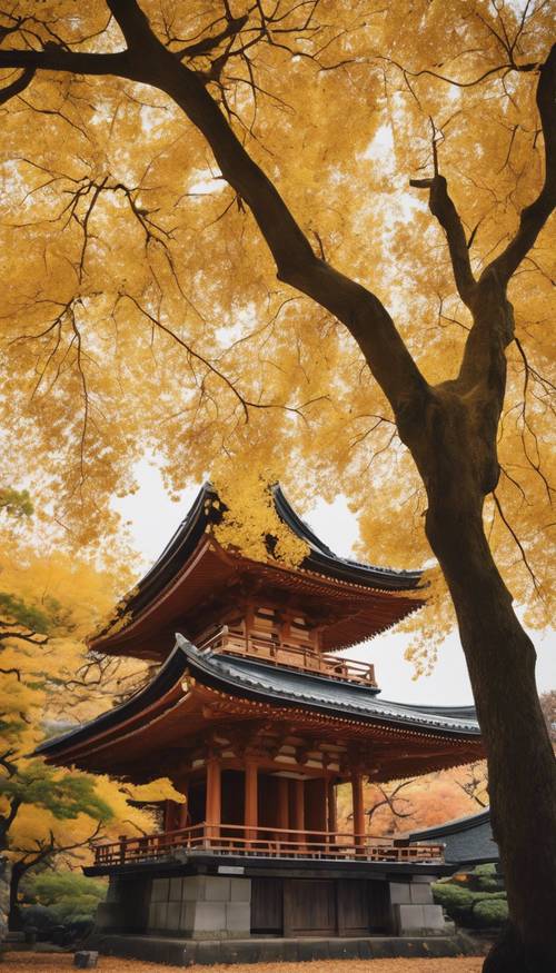 עץ גינקו גדול עם עלים צהובים עזים על רקע מקדש יפני מסורתי בסתיו
