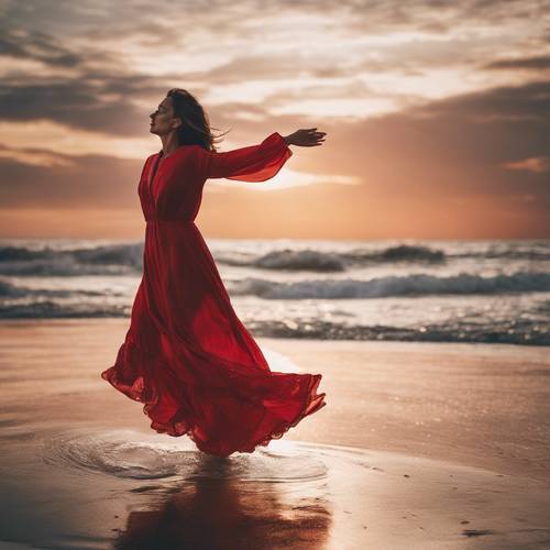 גברת בשמלה אדומה זורמת עושה סיבוב על חוף הים בשקיעה.