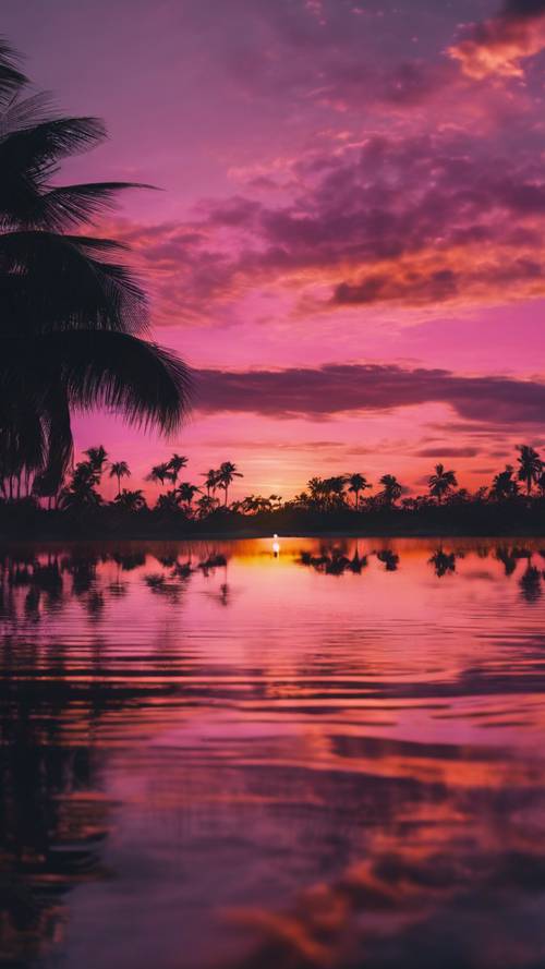 오렌지, 보라색, 핑크색으로 가득한 아름다운 일몰을 반사하는 윤기 나는 검은 라군입니다.