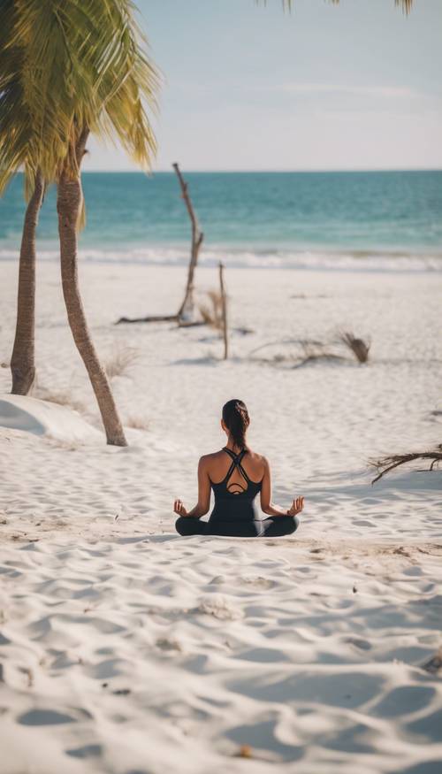 Spokojna sesja jogi na białej plaży podczas spokojnego poranka. Tapeta [797b7cd532df4f88827d]