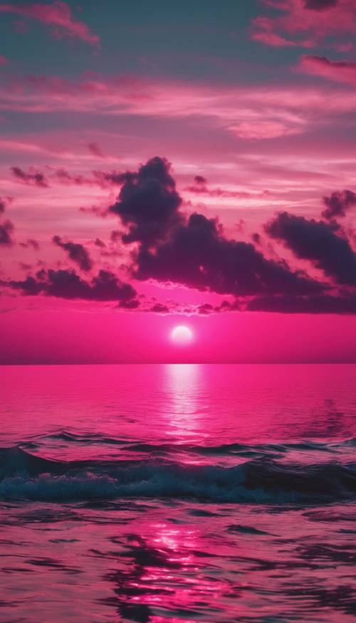 A neon hot pink sunset reflecting off of a calm and tranquil ocean.