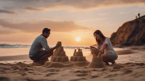 Una coppia costruisce castelli di sabbia su una spiaggia tranquilla, con uno splendido tramonto costiero sullo sfondo.